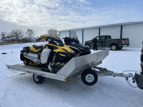 Snowmobiles on our 2-place snowmobile trailer