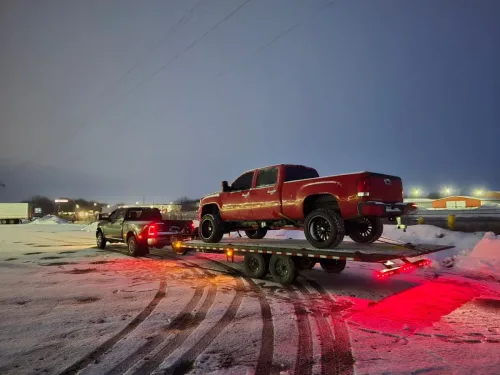 Chevy truck on our 24 foot deck over tilt trailer