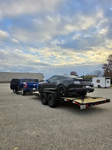Ford Mustang on our 20ft flatbed trailer