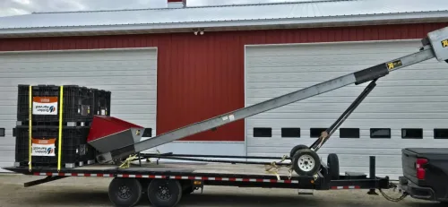 Farm equipment on our 24ft deckover trailer