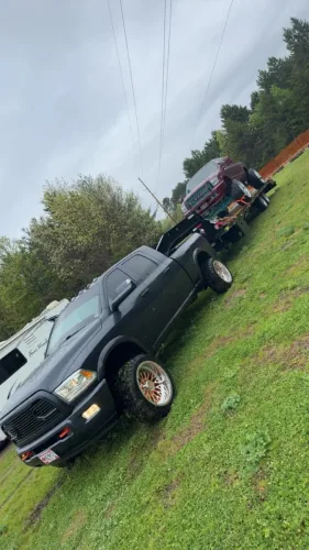 Our 36ft gooseneck trailer transporting a lifted, modified Ford F350