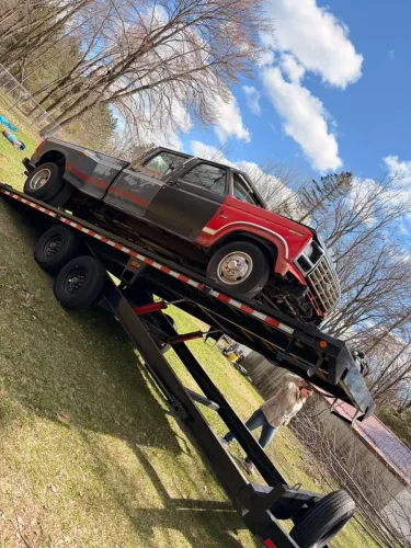 Dually Chevy on our 24ft deckover tilt trailer