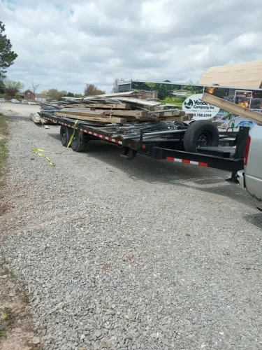 Greenhouse structure materials on our 24' deckover trailer