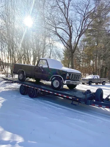 Old Ford truck on our 24 foot deck over tilt trailer
