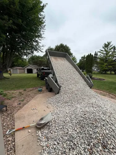 Our 7x14' dump trailer dumping a load of gravel