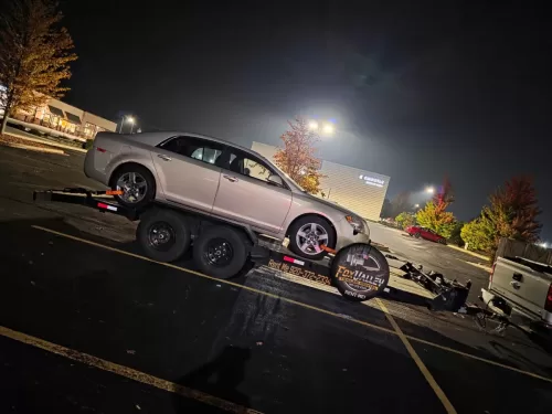 Chevy Malibu on our 20ft car hauler