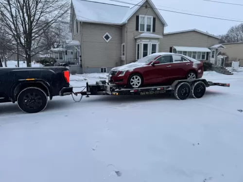 Sedan on 20ft car hauler trailer